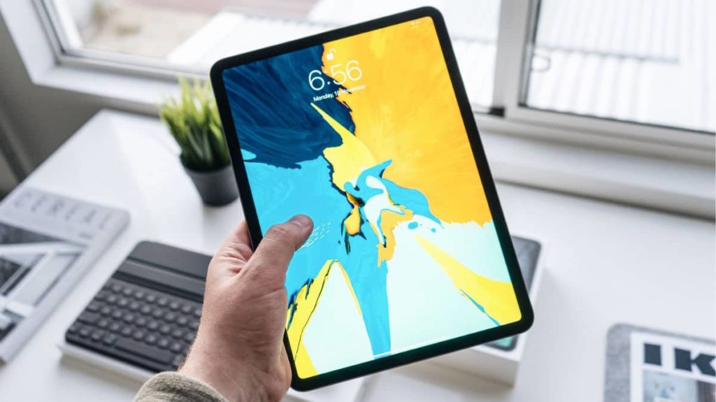 Apple iPad Pro In a Person Hand
